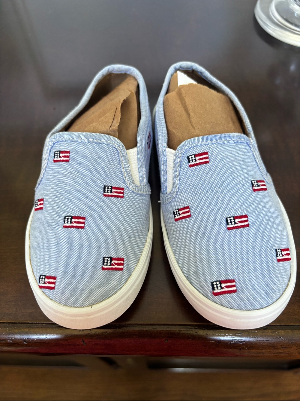 Janie and Jack Light Blue Slip-On Sneakers with Red & White Flag Embroidery